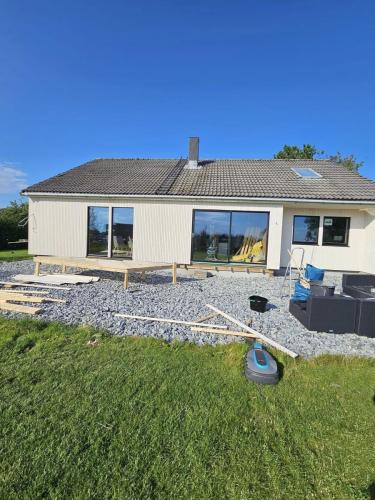 Vindusbytte og bordkledning